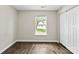 Clean bedroom with laminate flooring and natural light from a large window at 429 Merry Go Dr, York, SC 29745
