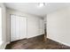 Bedroom featuring laminate flooring and a closet for storage at 429 Merry Go Dr, York, SC 29745