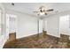 Spacious bedroom featuring wood-look floors, a ceiling fan, and neutral paint colors at 429 Merry Go Dr, York, SC 29745