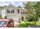 Charming two-story home with a well-maintained front yard, garage, and inviting entrance at 4312 Mary Point Rd, Monroe, NC 28110