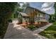 Charming home with a detached garage, a well-manicured lawn, and beautiful landscaping at 5014 Quail Canyon Dr, Charlotte, NC 28226
