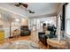 Bright and airy living room flows into a dining area and kitchen with hardwood floors at 5014 Quail Canyon Dr, Charlotte, NC 28226