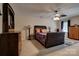 Cozy main bedroom with a large bed, stylish furniture, and a ceiling fan at 5014 Quail Canyon Dr, Charlotte, NC 28226
