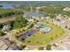 Aerial view of community amenities including a pool, tennis court, and parking at 5208 Admirals Lndg, Lancaster, SC 29720