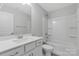 Bright bathroom featuring a tub-shower combo, a single sink vanity, and neutral decor at 5208 Admirals Lndg, Lancaster, SC 29720