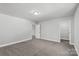 Spacious carpeted bedroom with closet and view into hall at 5208 Admirals Lndg, Lancaster, SC 29720