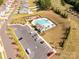 Aerial view of a neighborhood pool and playground with parking and landscaping at 5208 Admirals Lndg, Lancaster, SC 29720