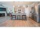 Open concept kitchen with stainless steel appliances, granite countertops, and a breakfast bar at 5391 Orchid Bloom Dr, Indian Land, SC 29707