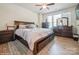 Bright main bedroom with hardwood floors and ample natural light at 5391 Orchid Bloom Dr, Indian Land, SC 29707