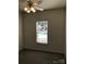 Neutral bedroom with carpet, ceiling fan and window at 5508 Burning Ridge Dr, Monroe, NC 28110