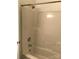 Clean bathroom featuring a neutral shower and updated fixtures at 5508 Burning Ridge Dr, Monroe, NC 28110