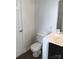 Toilet in bright bathroom with sink and doorway at 5508 Burning Ridge Dr, Monroe, NC 28110