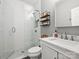 Modern bathroom with glass enclosed shower, marble vanity, and neutral colors at 5921 Meadowmere Dr, Monroe, NC 28110