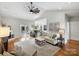 Bright living room features vaulted ceilings, a fireplace, and access to the outdoor patio at 5921 Meadowmere Dr, Monroe, NC 28110