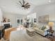 Bright living room features vaulted ceilings, a fireplace, and access to the outdoor patio at 5921 Meadowmere Dr, Monroe, NC 28110