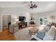 Spacious living room with a fireplace, media center, and patio access, offering great views at 5921 Meadowmere Dr, Monroe, NC 28110