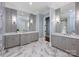 Large bathroom with double sinks, gray cabinetry, white countertops, and marble flooring at 6314 Saint Stephen Ln, Charlotte, NC 28210