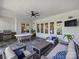 Large covered patio with outdoor dining, living area, a grill, and white brick accents at 6314 Saint Stephen Ln, Charlotte, NC 28210