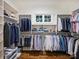 Spacious walk-in closet with natural light, custom shelves, and ample storage at 6314 Saint Stephen Ln, Charlotte, NC 28210