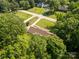 Beautiful aerial view of a single-Gathering home nestled among lush greenery and manicured lawns on a sunny day at 637 Freemont Dr, Lancaster, SC 29720
