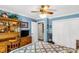 Comfortable bedroom features a light blue color, fan, and custom shelving for storage and decor at 637 Freemont Dr, Lancaster, SC 29720