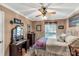 Cozy bedroom with quaint vanity, plush bedding, and light-filled window at 637 Freemont Dr, Lancaster, SC 29720