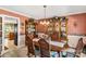 Formal dining room featuring a dining table, china cabinet and decorative wallpaper at 637 Freemont Dr, Lancaster, SC 29720