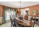 Bright dining room showcasing a wooden table with seating, elegant drapery, and stylish decor at 637 Freemont Dr, Lancaster, SC 29720