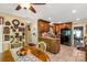 Charming kitchen with wood cabinets, black appliances, and adjacent breakfast nook at 637 Freemont Dr, Lancaster, SC 29720