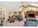Comfortable living room featuring a ceiling fan, plush seating, and lots of natural light at 637 Freemont Dr, Lancaster, SC 29720