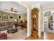 Inviting living room featuring a piano, grandfather clock, and elegant decor at 637 Freemont Dr, Lancaster, SC 29720