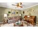 Cozy living room with comfortable seating, decorative artwork, and natural light at 637 Freemont Dr, Lancaster, SC 29720