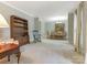 Bright and spacious living room with ample seating and neutral carpet at 7118 Powder Mill Pl, Charlotte, NC 28277