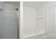 Bathroom featuring a separate shower and tub, bright walls, and modern fixtures at 722 Overlook Rd, Lowell, NC 28098
