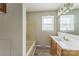 Full bathroom with a bath and vanity with a white countertop at 1019 Carmel Dr, Gastonia, NC 28056