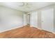 This bedroom has lots of natural light and hardwood floors at 1019 Carmel Dr, Gastonia, NC 28056