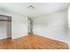Bright bedroom features hardwood floors and a large closet for storage at 1019 Carmel Dr, Gastonia, NC 28056