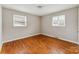 The bedroom has hardwood flooring and lots of natural light at 1019 Carmel Dr, Gastonia, NC 28056