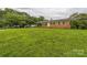Ranch style home with green front yard at 1019 Carmel Dr, Gastonia, NC 28056