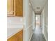 Hallway with wood-look vinyl flooring and neutral paint at 1019 Carmel Dr, Gastonia, NC 28056