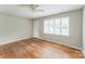 Spacious living room with hardwood floors, ceiling fan and a window at 1019 Carmel Dr, Gastonia, NC 28056