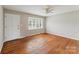 Bright living room featuring hardwood floors, a window and ceiling fan at 1019 Carmel Dr, Gastonia, NC 28056