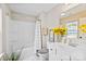 This bathroom offers a shower and tub, a white sink vanity, and decor that adds a pop of color at 11195 Argosy Dr # 1098, Lancaster, SC 29720