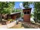 Unique architectural home with stunning lake views, set amidst lush greenery with private decks at 11195 Argosy Dr # 1098, Lancaster, SC 29720