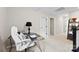 Bright hallway featuring a glass-topped desk, white chair, neutral walls, and plush carpeting at 11195 Argosy Dr # 1098, Lancaster, SC 29720