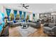 Open-concept living area boasts hardwood floors, modern decor, and a seamless flow into the kitchen at 11195 Argosy Dr # 1098, Lancaster, SC 29720