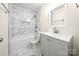 Charming bathroom with shower-tub, tile, updated vanity, faucet, and mirror at 1122 Oconee Ave, Rock Hill, SC 29732