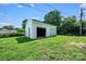 This charming detached garage offers extra storage space and boasts convenient garage door and separate door at 1122 Oconee Ave, Rock Hill, SC 29732