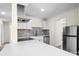 Modern kitchen with stainless steel appliances, white cabinetry, and a stylish backsplash, perfect for cooking at 1122 Oconee Ave, Rock Hill, SC 29732