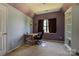 Cozy bedroom space with desk, plush carpeting, built-in shelving and natural light at 1226 Rising Oak Dr, Charlotte, NC 28206